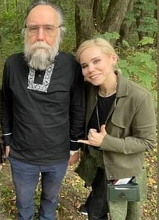 File:Daria Dugina tweeted this photo of her, with her prominent father Aleksander Dugin, shortly before her death, in a car explosion, while driving his car.jpg