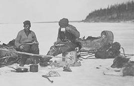 John Hornby and Norman Robinson and their dogs stop for tea on a frozen river - N-2002-005-0021 141.jpg