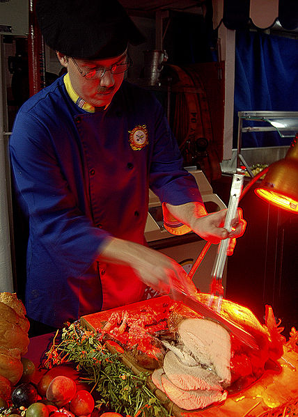 File:428px-US Navy 061123-N-1598C-004 Culinary Specialist Seaman Eric Trute carves a turkey in preparation for the Thanksgiving Day meal on the mess decks of the amphibious assault ship USS Saipan (LHA 2).jpg