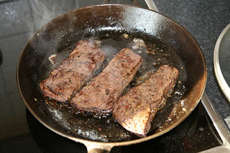 Pan fried fresh whale meat steaks, seasoned with just salt and pepper.