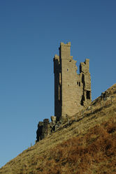 (CC [5]) Photo: Mike Cooper One of Dunstanburgh Castle's towers, the Lilburn Tower, seen from the south