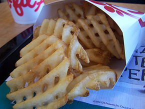 Waffle fries. Potatoes are cut crossways with a special tool to form the unique "waffle" shape, then prepared. These waffle fries are made by Chik-fil-A, a popular fast-food chain restaurant in the United States of America, who is sometimes cited as popularizing the cut.