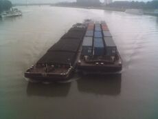 Barge carrying shipping containers.