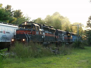 (CC) Photo: William Stone Jr. A trio of Guilford Rail System SD26s, then the last three units in existence, round the wye at Ayer, Massachusetts in July 2004.
