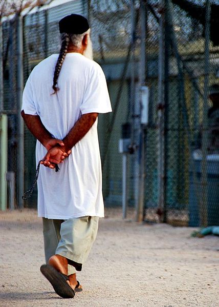 File:Compliant Guantanamo captive is allowed to stroll the exercise yard.jpg