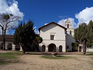 (CC) Photo: Robert A. Estremo A view of the restored Mission San Juan Bautista and its added three-bell campanario ("bell wall") in 2004. Two of the bells were salvaged from the original chime, which was destroyed in the 1906 San Francisco earthquake.