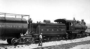 (PD) Photo: Ralph P. Stineman Locomotive No. 50 of the San Diego and Arizona Railway line stands at a siding.