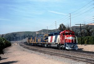 © Photo: Joe Blackwell The Super C passes the Esperanza siding near the City of Yorba Linda, California with one of four AT&SF SD45 locomotives specially decorated in honor of America's bicentennial on point.