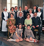 Hudson (fifth from left, top) played by Gordon Jackson in the television series Upstairs, Downstairs.