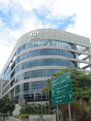 Picture of a modern office building of 5 stories.