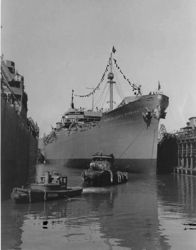 (PD) Photo: Army Corps of Engineers USNS Mission Santa Barbara (T-AO-131) on July 8, 1944 leaving Marinship after delivery. Docked at left is USNS Mission Santa Clara (T-AO-132).