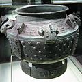 A Shang Dynasty bronze pou vessel with four ram heads