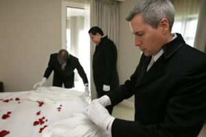 Richard McIntosh, Paul Mrus and Jeff Murray during their butler training at the Rosewood hotel.jpg