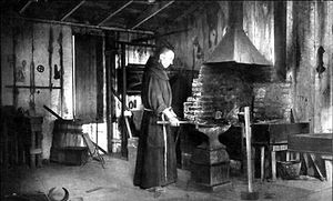 (PD) Photo: Artist unknown A blacksmith works at Mission Santa Barbara in 1898.