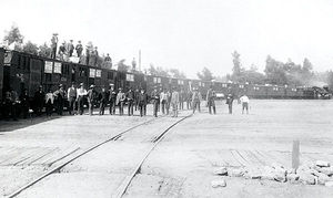 (PD) Photo: Unknown A special eastbound fast fruit prepares to depart a Central Pacific Railroad passenger station on June 24, 1886. This train was chartered by W. R. Strong & Co. and Edwin T. Earl, fruit packers and shippers, Sacramento.