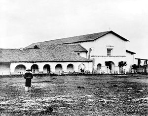 (PD) Photo: Edward Vischer An exterior view of the Mission San Juan Bautista, taken before 1875.