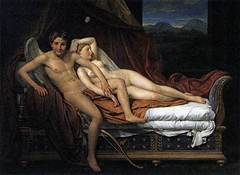 A man and a woman in a bed.